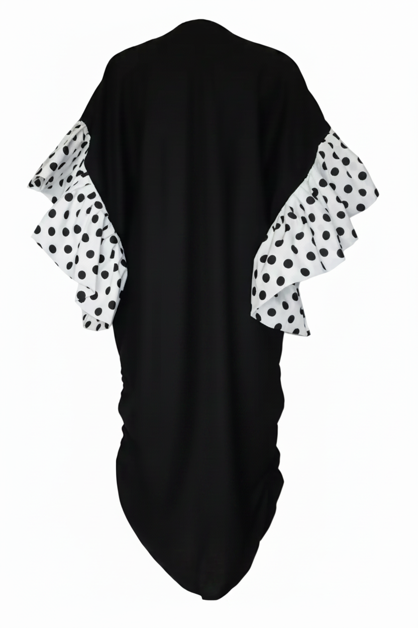Black linen kimono with polka dot sleeves on a mannequin against a white background by Mesan