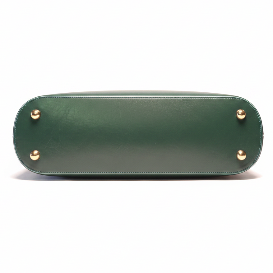 Fefe forest green bottom view with gold studs.
