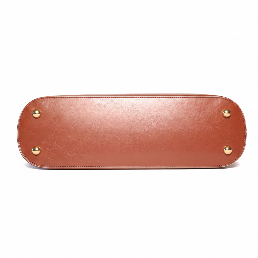 Fefe in cacao Brown leather bag with gold studs on a white background